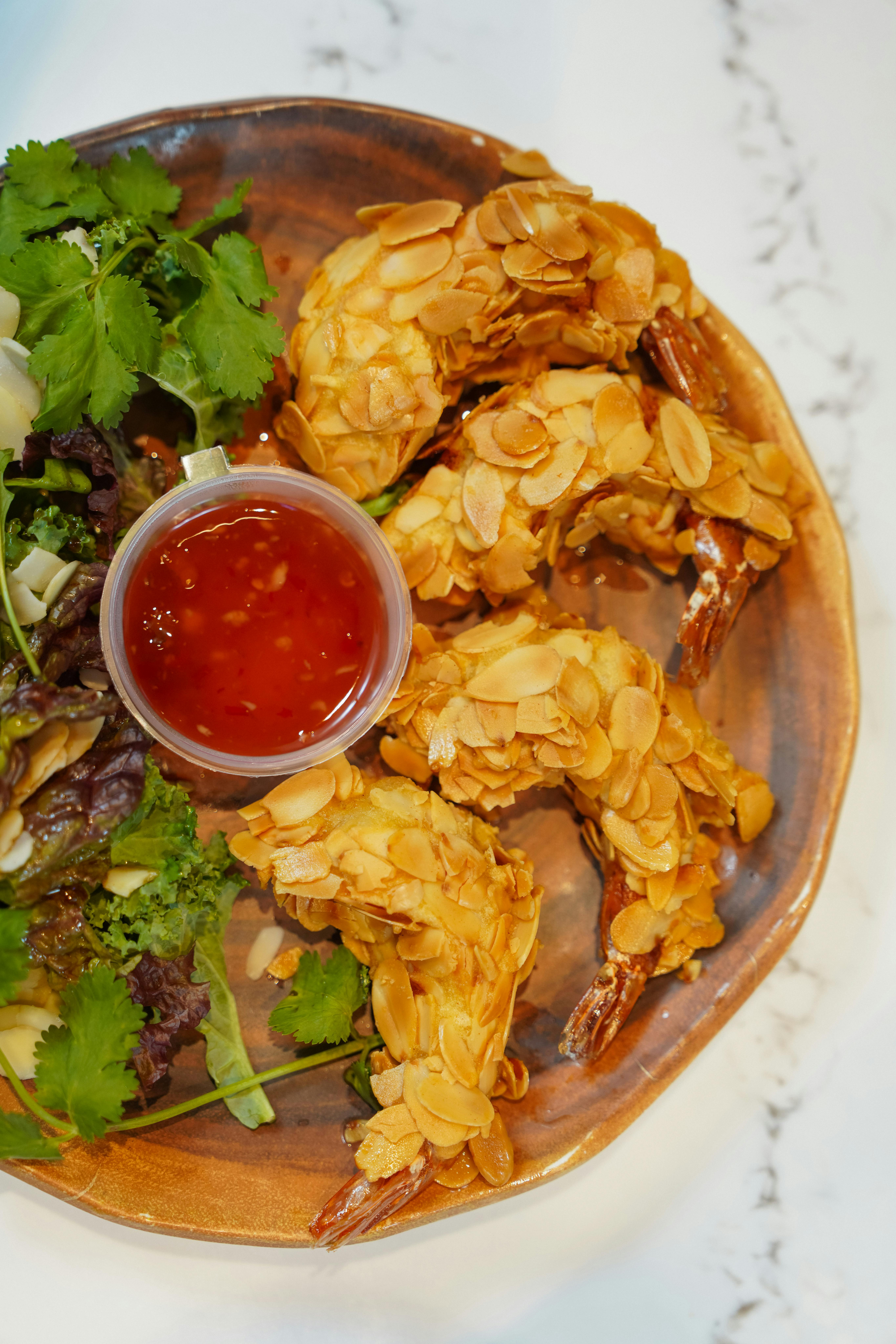 A picture of the finished Coconut Shrimp appetizer dish.